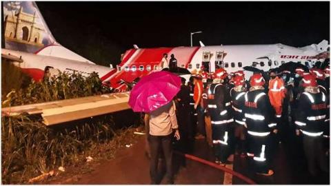 تیم نجات هواپیمای حادثه دیده در هند تست كرونا می دهند
